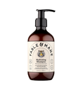 A bottle of Fable & Mane Hydrating Shampoo in an amber brown bottle with a black pump dispenser and a cream-colored label featuring a tiger illustration.